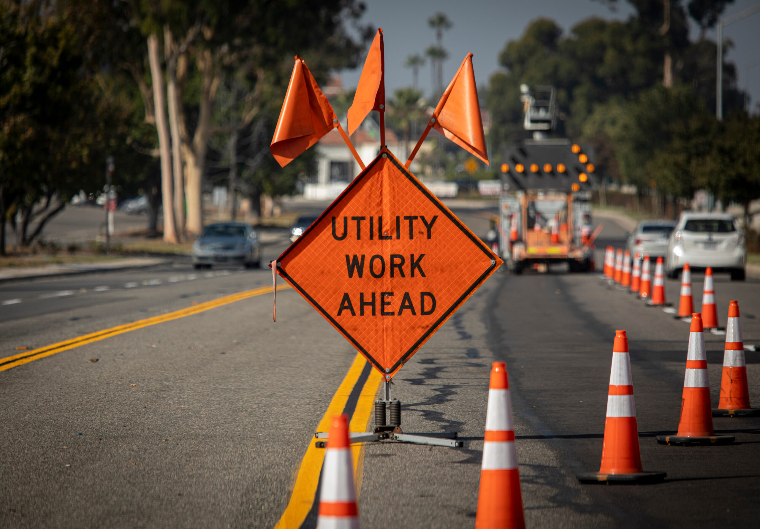 Traffic,Sign,With,Flags,Reading,Utilitary,Work,Ahead,With,Traffic