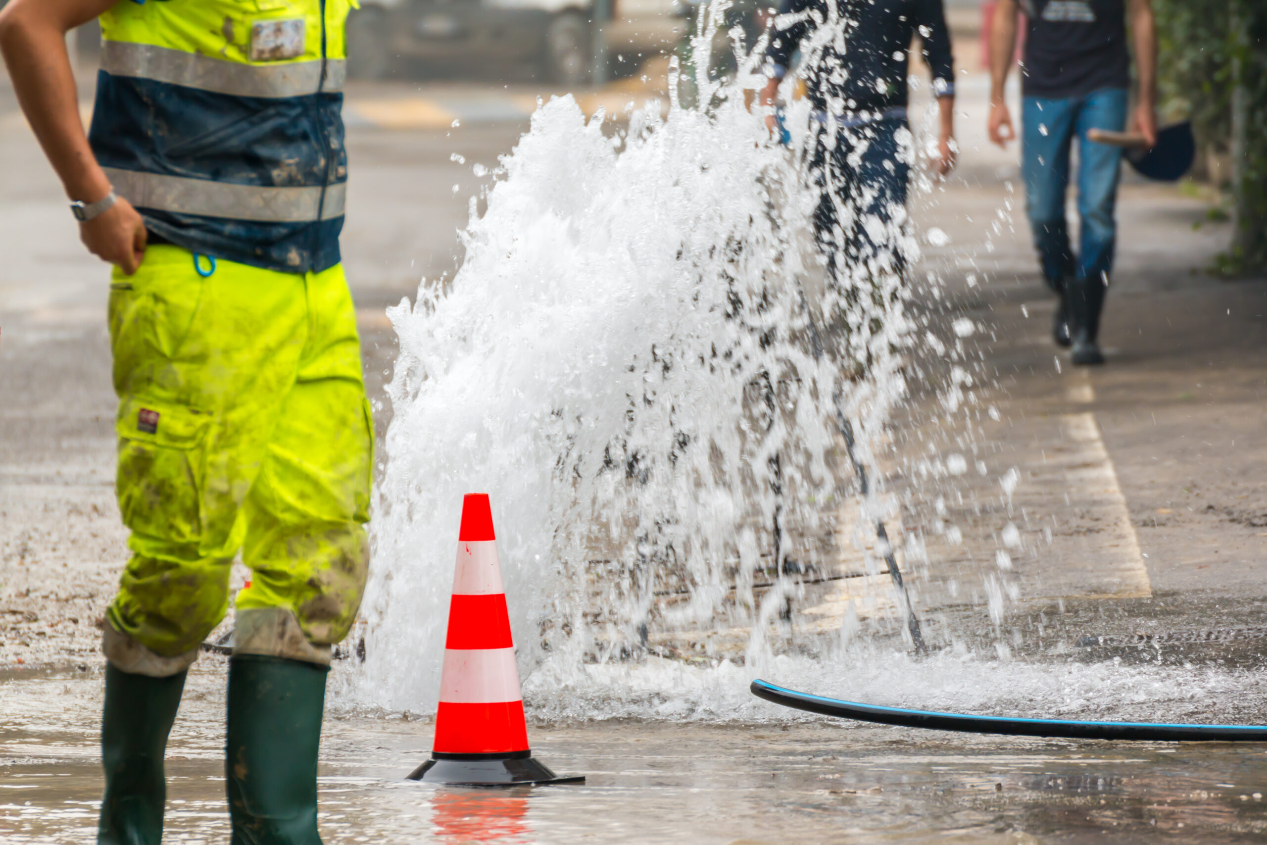 Road,Spurt,Water,Beside,Traffic,Cones