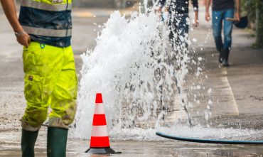 Road,Spurt,Water,Beside,Traffic,Cones Road,Spurt,Water,Beside,Traffic,Cones